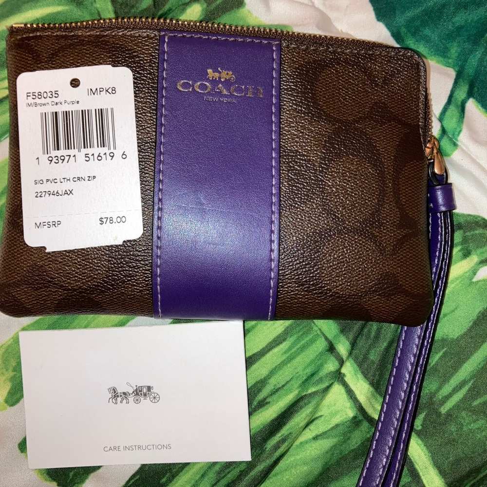 Brown and Purple Coach Wristlet used with tag
